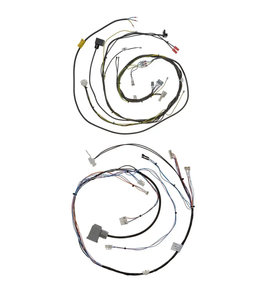 Kabelbaum von Brötje, bestehend aus mehreren Kabeln und Steckverbindern, in zwei Spiralen angeordnet. Eignet sich für den Anschluss elektrischer Komponenten.
