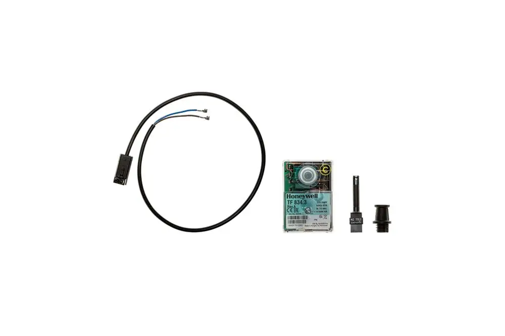 Brötje Steuergerät mit Kabel und Anschlüssen, bestehend aus einem elektrischen Teil und einem Montagezubehör zur Nutzung in Heizungsanlagen.