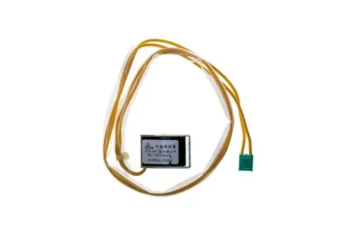 Brötje Zündspule mit zwei gelben Kabeln und grünem Stecker. Die elektronische Komponente ist in einer transparenten Verpackung sichtbar.