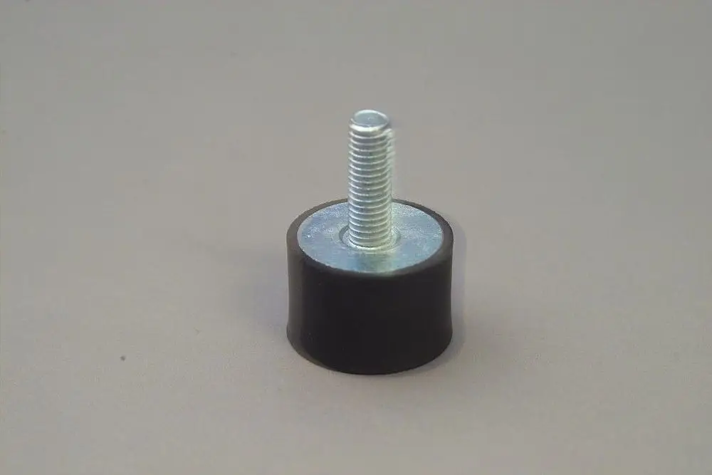 Brötje Schwingungsdämpfer mit einer zylindrischen Gummibasis und einem metallischen Gewinde zur Montage. Stabile Konstruktion mit flacher Oberseite.