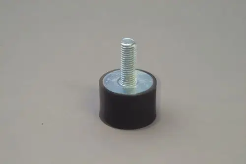 Brötje Schwingungsdämpfer mit einer zylindrischen Gummibasis und einem metallischen Gewinde zur Montage. Stabile Konstruktion mit flacher Oberseite.