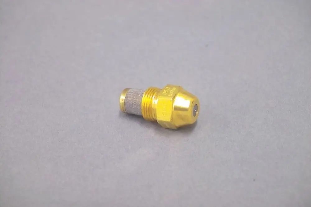 Brötje Düse in Goldfarbe mit einem konvexen Ende und Gewinde, geeignet für Heizungsanwendungen. Die Düse hat eine geriffelte Oberfläche für besseren Halt.