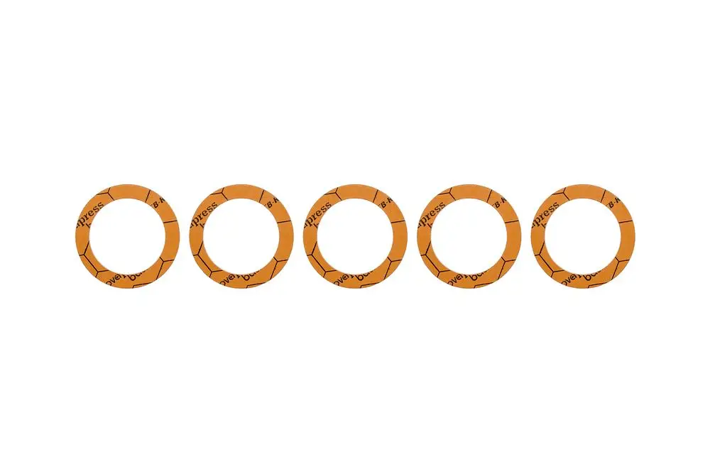 Fünf orangefarbene Dichtungsringe mit der Marke Brötje, die kreisförmig angeordnet sind, auf hellem Hintergrund.