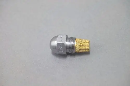 Brötje Düse aus Metall mit einer runden, konvexen Spitze und einem zylindrischen Gewinde, ausgestattet mit einer goldfarbigen Filterelement.