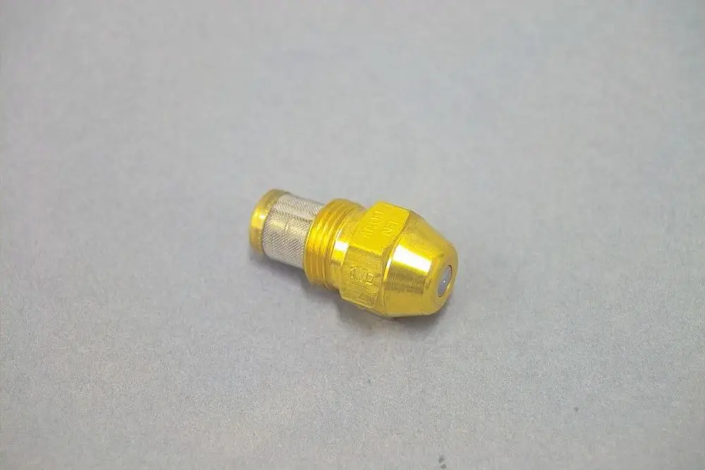 Goldfarbene Düse von Brötje mit konischer Form und einem feinen Gitter auf der Seite, auf grauem Hintergrund.