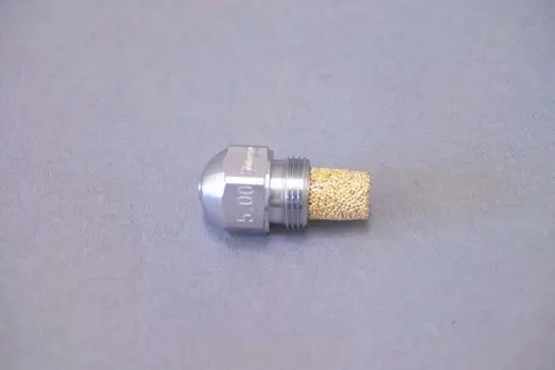 Brötje Düse aus Metall mit goldfarbener poröser Spitze, zum Einsatz in Heizsystemen. Strukturierte Oberfläche und gewindeartiger Anschluss sind sichtbar.