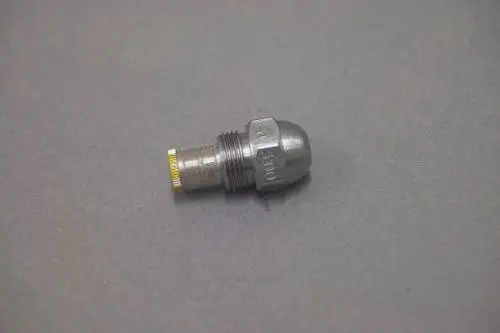 Brötje Düse aus Metall mit runder Kappe und Gewinde, geeignet für fluidtechnische Anwendungen. Der Körper ist silbern und weist eine präzise Verarbeitung auf.