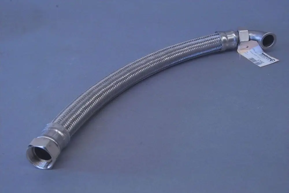 Metallflexschlauch mit zwei Anschlüssen, einer gerade und einer abgewinkelt. Der Schlauch hat ein genopptes Muster und ist für Verbindungssysteme geeignet. Marke: Brötje.