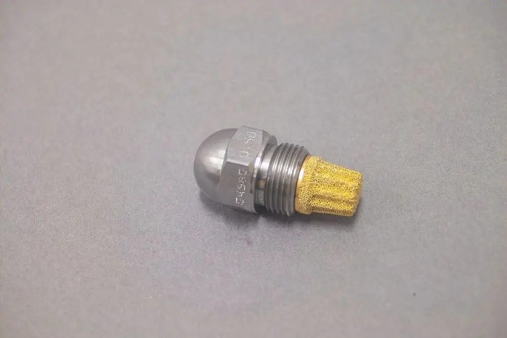 Brötje Düse mit runder Metallspitze und goldenem Filteraufsatz, auf grauem Hintergrund. Die Düse ist für Fluidics ausgelegt und zeigt keine speziellen Maße oder Typen.