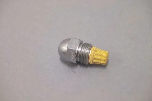 Brötje Düse mit runder Metallspitze und goldenem Filteraufsatz, auf grauem Hintergrund. Die Düse ist für Fluidics ausgelegt und zeigt keine speziellen Maße oder Typen.