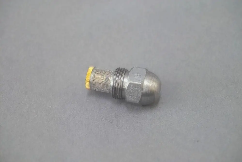 Brötje Düse aus Metall mit konischem Ende und Gitterstruktur. Der Anschluss ist gewindeartig, geeignet für Flüssigkeitsanwendungen.