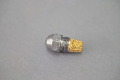 Brötje Düse mit metallischem Körper und einer Kappe aus porösem Material, möglicherweise für Flüssigkeitsverteilung oder Sprühfunktion in einem technischen System.