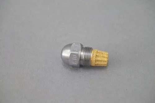 Ein silbernes Metallteil mit einer runden, glatt geformten Oberseite und einem goldfarbenen, strukturierten Ende. Die Marke Brötje ist sichtbar eingeprägt.