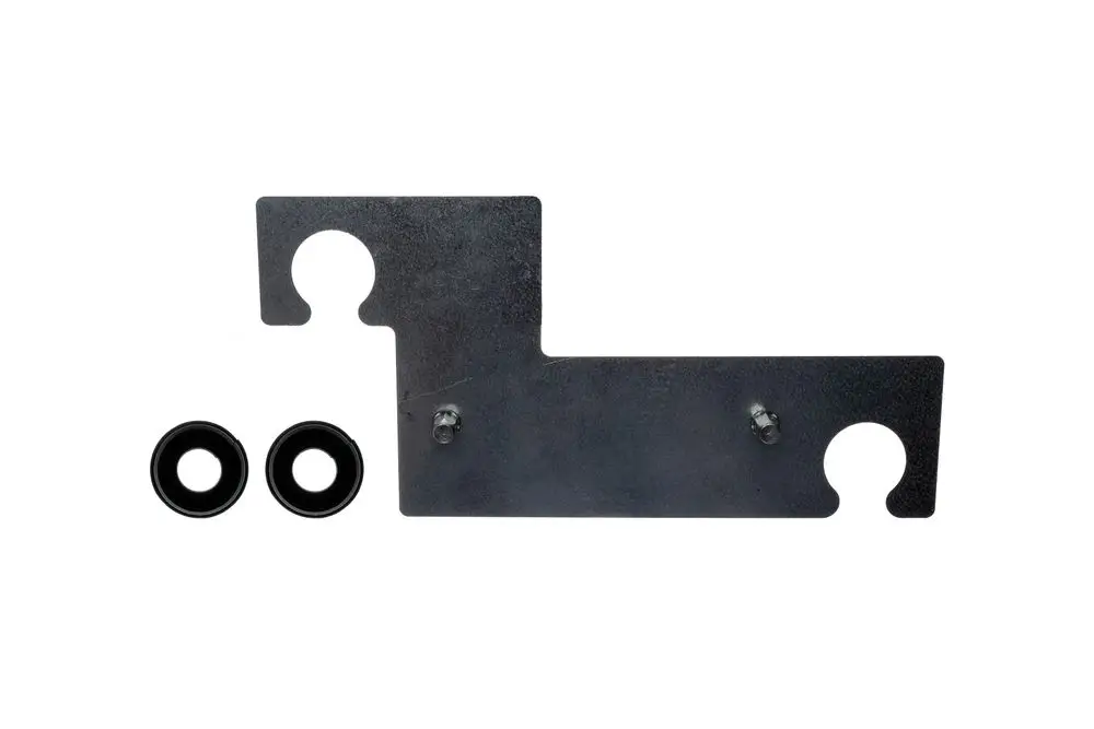 Brötje-Halterung aus Metall mit zwei runden Ausschnitten und zwei schwarzen Dichtungen, montiert in einer L-Form. Klar strukturierte Oberfläche.