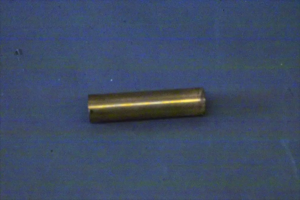 Brötje Verteiler in zylindrischer Form, metallisch, ohne erkennbare Maße oder Details, auf einer neutralen Fläche platziert.