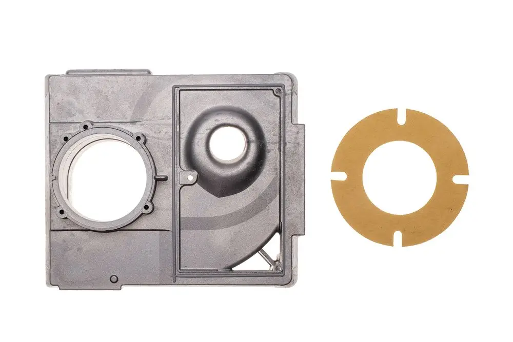Brötje Grundplatte aus Metall mit zwei Öffnungen, einer großen und einer kleinen, sowie einer runden Dichtung daneben. Klar strukturiert für technische Anwendungen.