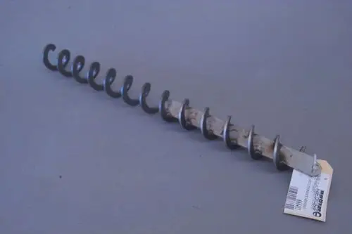 Brötje Wirbulator mit spiralförmigem Körper und mehreren Windungen, Metall, montierbar, auf grauem Hintergrund liegend.