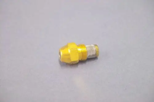 Brötje Düse in gelber Farbe mit konischem Kopf und metallem Anschluss, geeignet für Heizungsanwendungen, auf grauem Hintergrund.