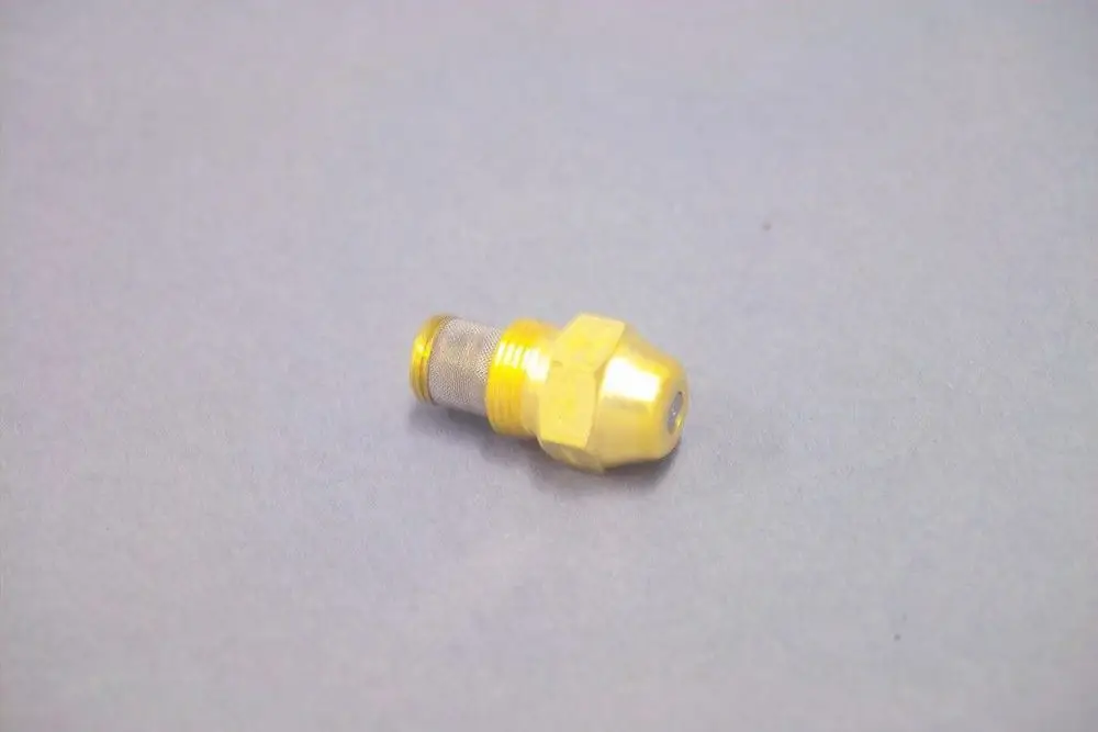 Brötje Düse in gelber Metallausführung, spitz zulaufend mit einem Gewindeanschluss. Die Düse hat einen Siebfilter und ist für spezifische Heizsysteme konzipiert.