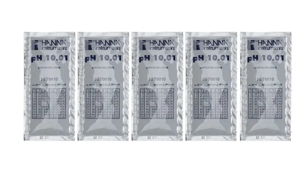 Fünf Packungen Brötje Pufferlösung für pH 10,01, jeweils 20 ml, mit pH-Wert-Tabellenaufdruck und Hinweis zur Temperaturkorrection auf der Vorderseite.