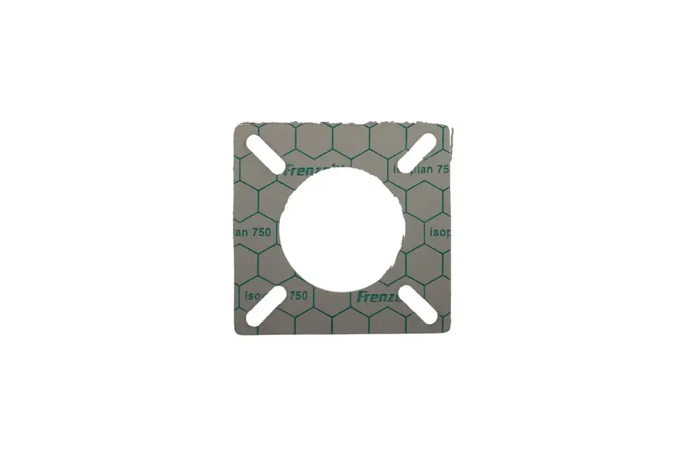 Brötje Dichtung mit quadratischer Form und innenliegendem Loch, auf grauer Oberfläche mit grüner Kennzeichnung und hexagonalem Muster.