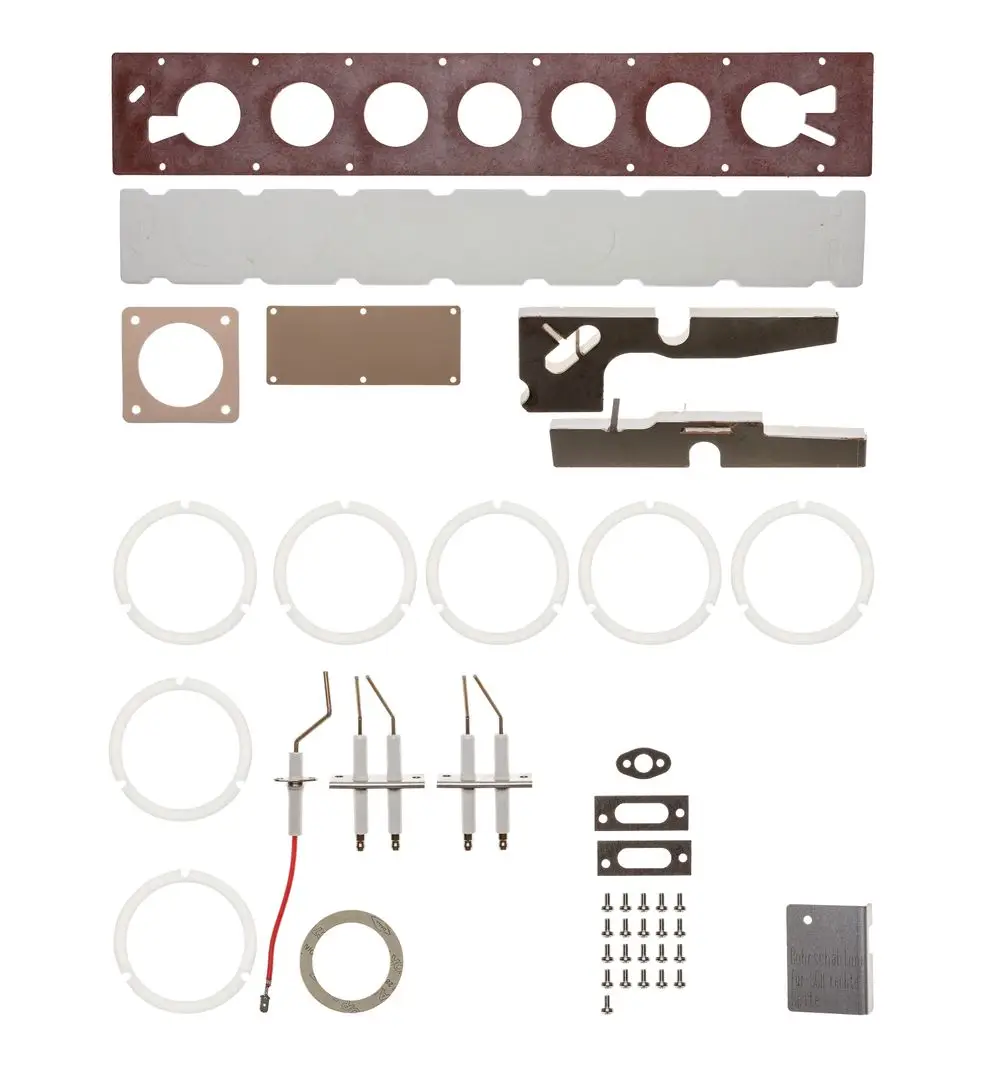 Wartungsset mit verschiedenen Dichtungen, Metallteilen, einer Platine und elektrischen Komponenten, geeignet für Brötje Heizsysteme.