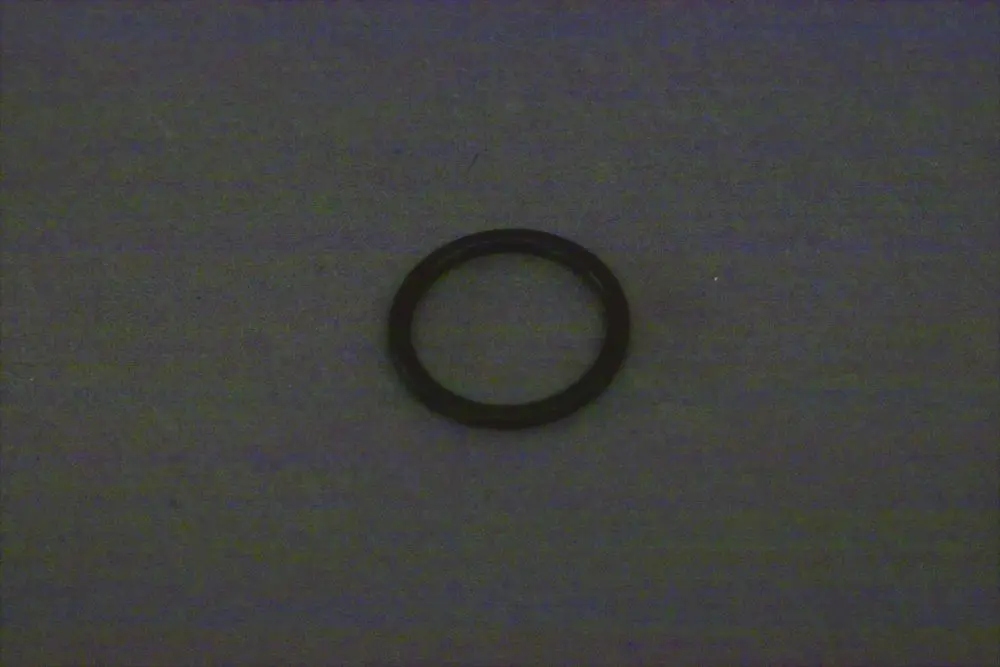Schwarzer O-Ring auf grauem Untergrund, möglicherweise für Heizungs- oder Sanitäranwendungen der Marke Brötje.