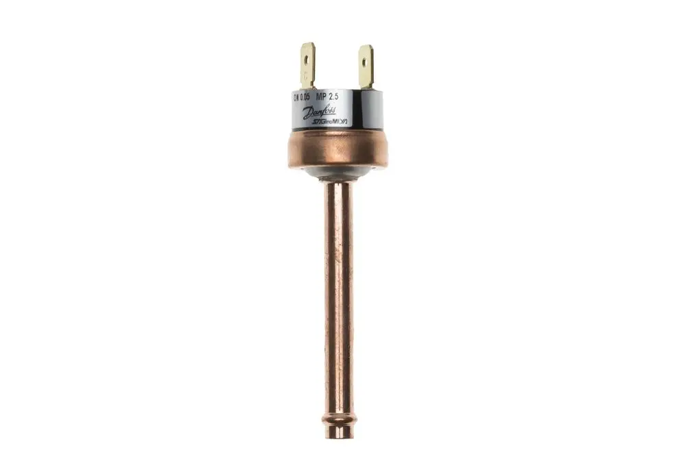 Niederdruckwächter von Brötje mit einem senkrechten, kupferfarbenen Element und zwei elektrischen Anschlüssen oben, zum Einsatz in Heizsystemen.