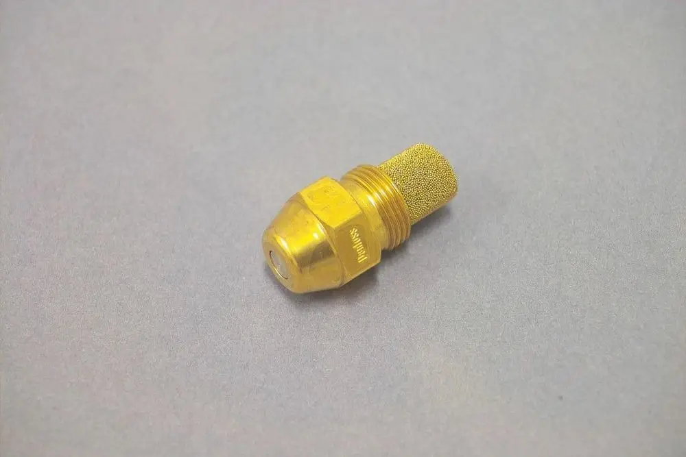 Brass-Düse von Brötje, mit einem Netzfilter an der oberen Seite und einem Gewinde zur Verbindung in Heizungsanlagen.