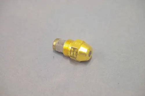 Brötje Düse in goldener Ausführung, konisch geformt mit einem Loch in der Spitze, vermutlich für Flüssigkeitsförderung oder -verteilung in Heizsystemen genutzt.