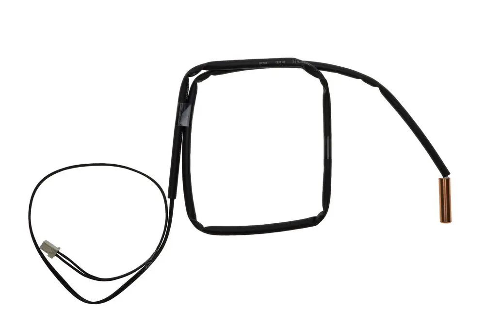 Brötje-Sensor mit einem rechteckigen Gehäuse und einem Kupferstab, verbundene Kabel für elektrische Anschlüsse.