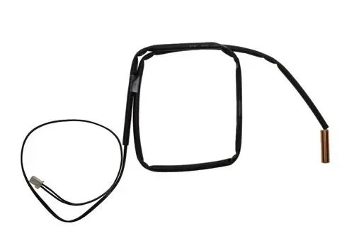 Brötje-Sensor mit einem rechteckigen Gehäuse und einem Kupferstab, verbundene Kabel für elektrische Anschlüsse.