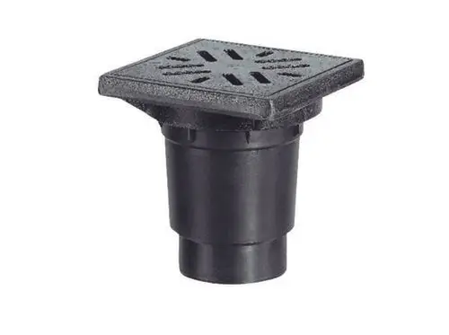 Dallmer Ablaufsystem mit quadratischem Gitterrost, ausgestattet mit einem runden Rohranschluss zur Wasserableitung. Schwarz, aus robustem Material gefertigt.