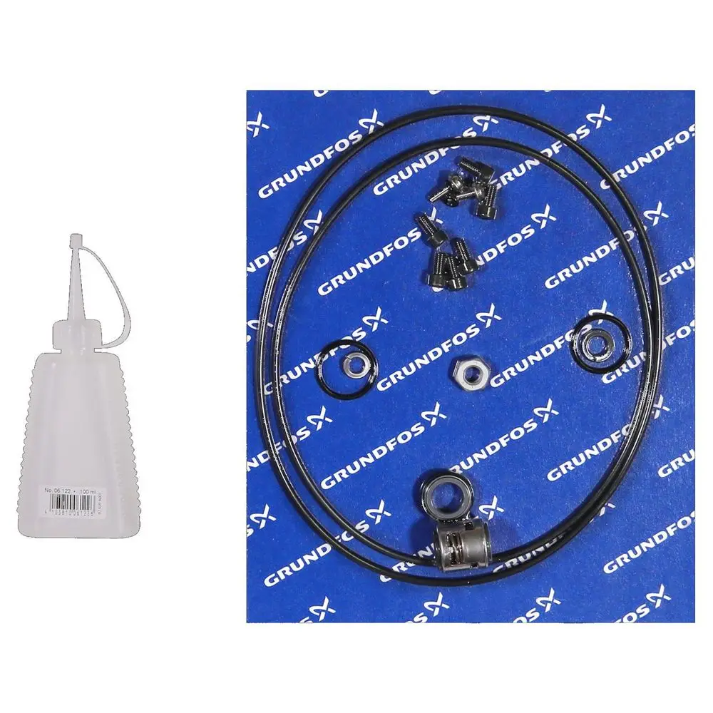 Ersatzteil-Kit von Grundfos, bestehend aus mehreren metallischen und gummierten Komponenten sowie einer weißen Flasche für die Anwendung.