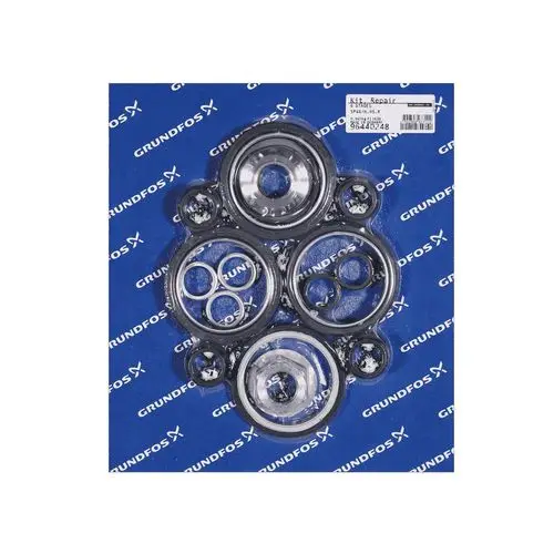 Ersatzteil-Kit von Grundfos, bestehend aus verschiedenen Dichtungen und Verschleißteilen, auf blauer Verpackung.