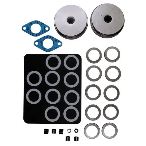 Zwei Metallzylinder, mehrere Dichtungen, Gasket-Dichtungen und andere kleine Teile in einem Set für Grundfos-Pumpen, angeordnet auf schwarzem Hintergrund.