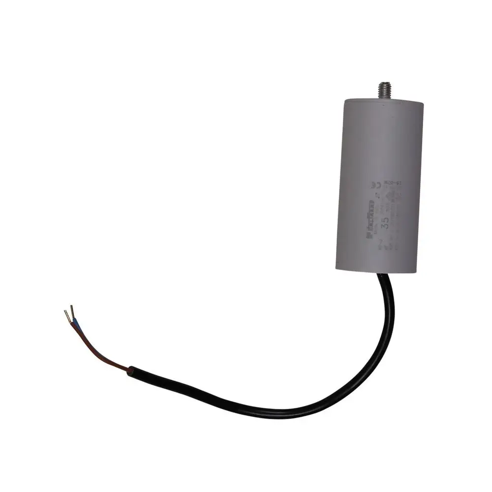 Kondensator mit angeschlossenen Drähten, erkennbar durch die graue Gehäusefarbe. Teil von Grundfos-Produkten zur Unterstützung der Funktionalität.
