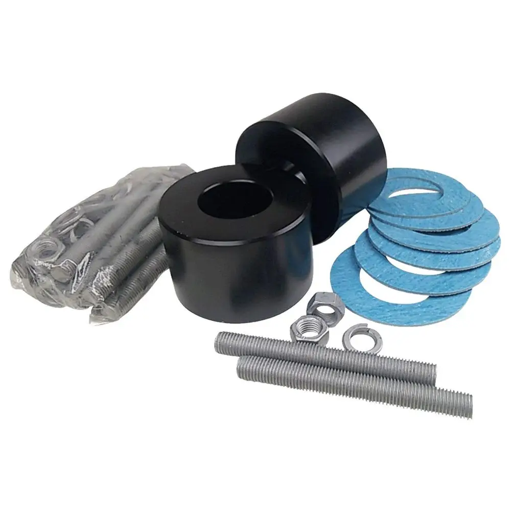 Zubehörset von Grundfos für Umwälzpumpen, bestehend aus zwei schwarzen Ausgleichsstücken, Dichtungen, Bolzen und Schraubenzubehör in einer Verpackung.