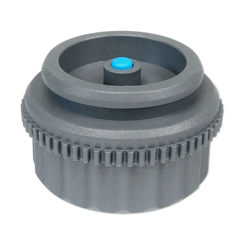 Grauer Adapter mit kreisförmigem Design und gezahntem Rand, hergestellt von Danfoss, genutzt zur Ventilanpassung. Der zentrale Punkt ist blau.