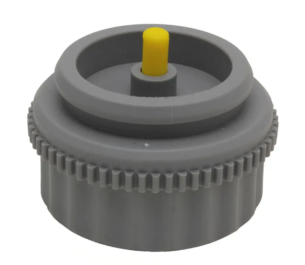 Grauer Adapter mit gelbem Griff, geeignet zur Ventilanpassung. Produkt von Danfoss, verwendet in Verbindung mit Schlössern bis 1993.