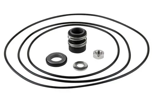 Set bestehend aus mehreren Gleitringdichtungen und O-Ringen, geliefert von Wilo, für mechanische Anwendungen. Zubehörteile in schwarzer und silberner Farbe angeordnet.