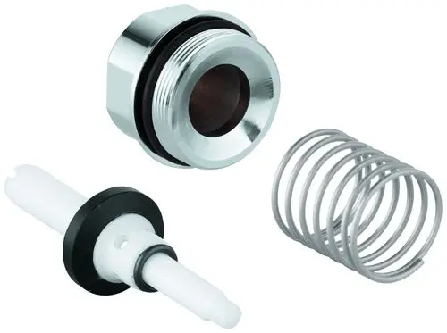 Grohe-Elemente zur Umstellung mit einem Gewindeteil, einem weißen Kunststoffelement und einer Metallfeder, die für die Wannenbatterie verwendet werden.