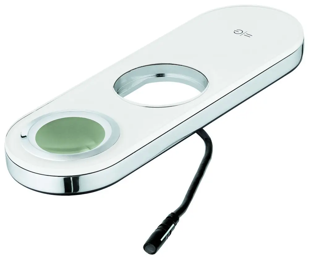 GROHE Bedienpaneel in einer ovalen Form mit zwei runden Öffnungen, einer davon grün. An einem Kabel befestigt, in einer schlichten, modernen Optik.