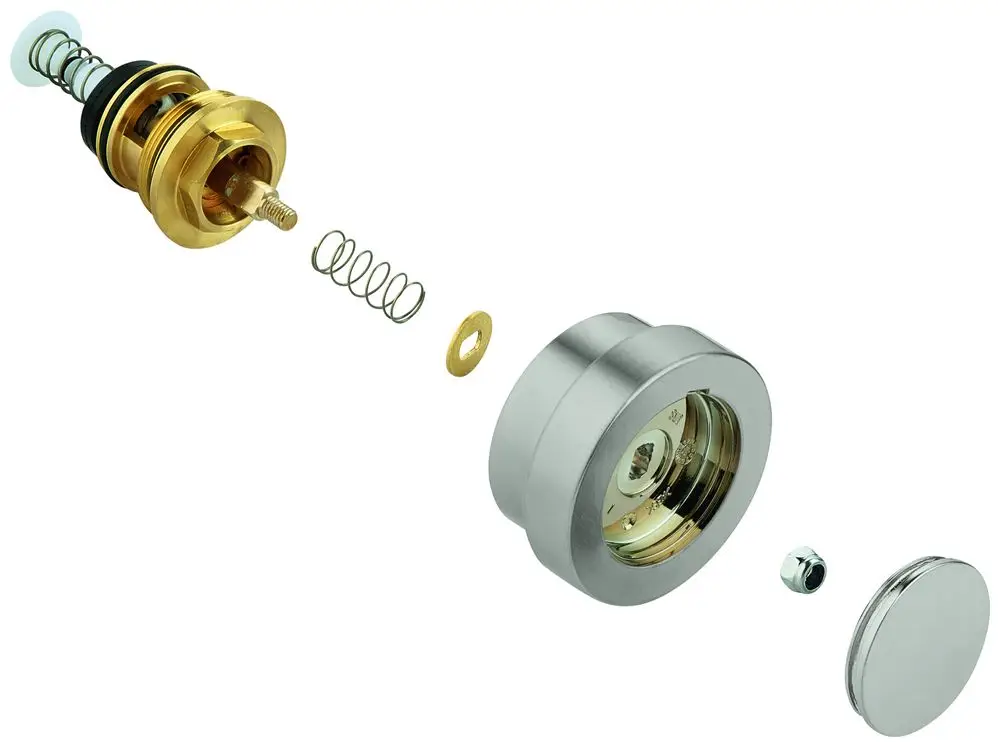 Grohe Umstellungsmechanismus aus Messing und Edelstahl, zerlegt in Einzelteile: Ventil, Feder, Dichtungen und Abdeckungen für Badezimmer-Armaturen.