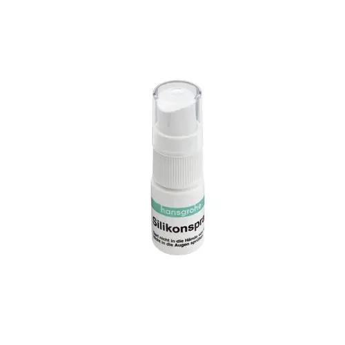 Weißes Spray-Fläschchen mit Pumpkopf und schwarzer Beschriftung auf der Vorderseite. Marke: Hansgrohe. Anwendungshinweis: Nicht in die Hände oder Augen sprühen.