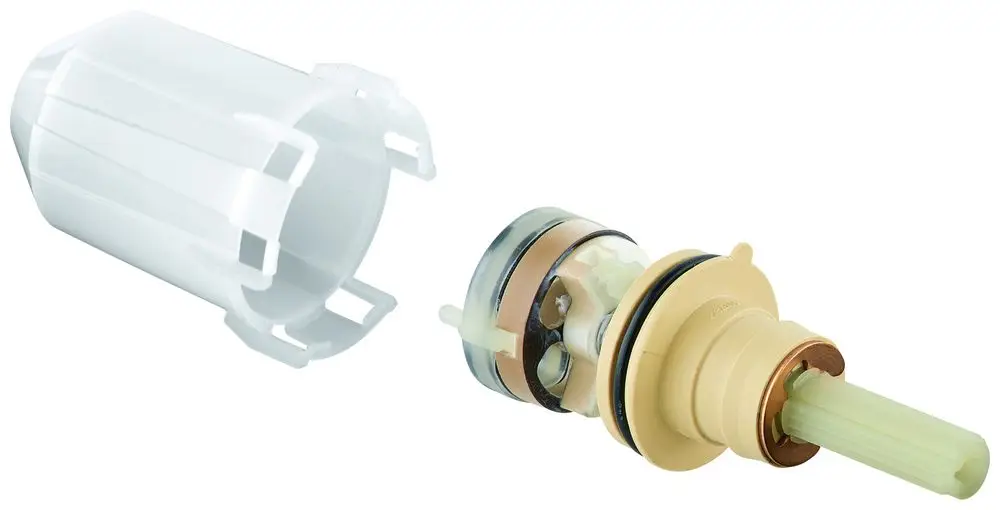 GROHE Umstellungselement für einen Einhandmischer, bestehend aus einem transparenten Halter und einer inneren Mechanik mit verschiedenen Dichtungen und Anschlüssen.