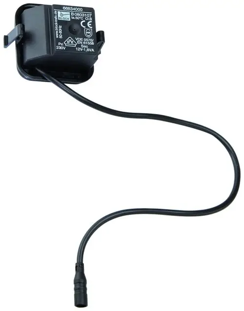 Schwarzer Steck-Transformator mit Kabel und Stecker, hergestellt von Grohe, für die Umwandlung von Elektrizität in Niederspannung.