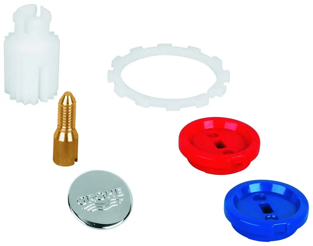GROHE Ersatzteile bestehend aus einer weißen Halterung, einer Messingverschraubung, einer transparenten Dichtung sowie roten und blauen Knöpfen für die Griffbefestigung.
