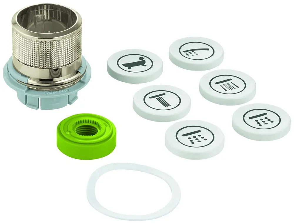 GROHE Druckknopfbetätigung mit mehreren Aufsätzen in verschiedenen Designs. Teile umfassen einen Einsatz, eine grüne Dichtung und ein transparentes O-Ring.