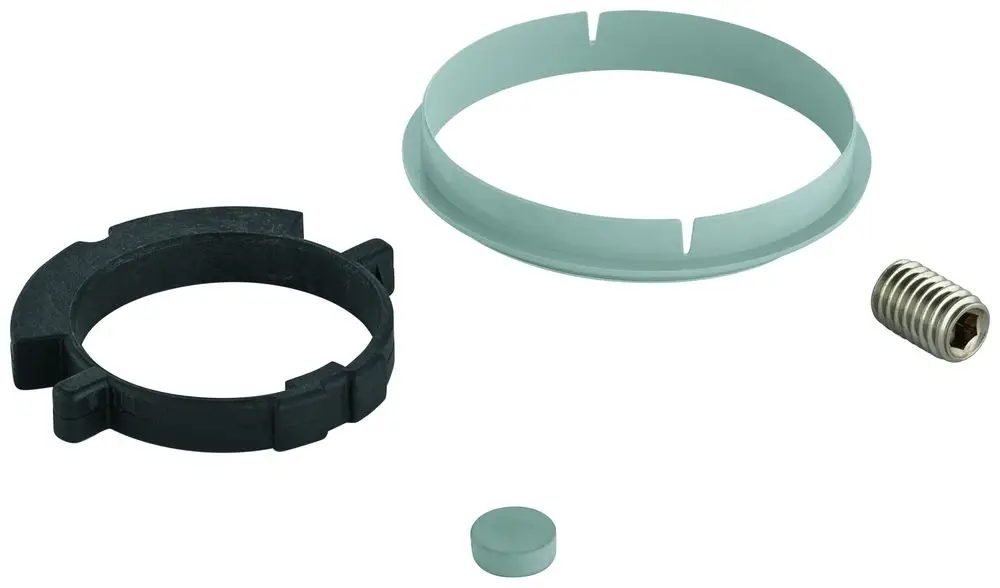 Befestigungsset mit verschiedenen Komponenten von Grohe, bestehend aus einem schwarzen Ring, einer hellen Halterung, einem kleinen Magneten und einer Schraube.